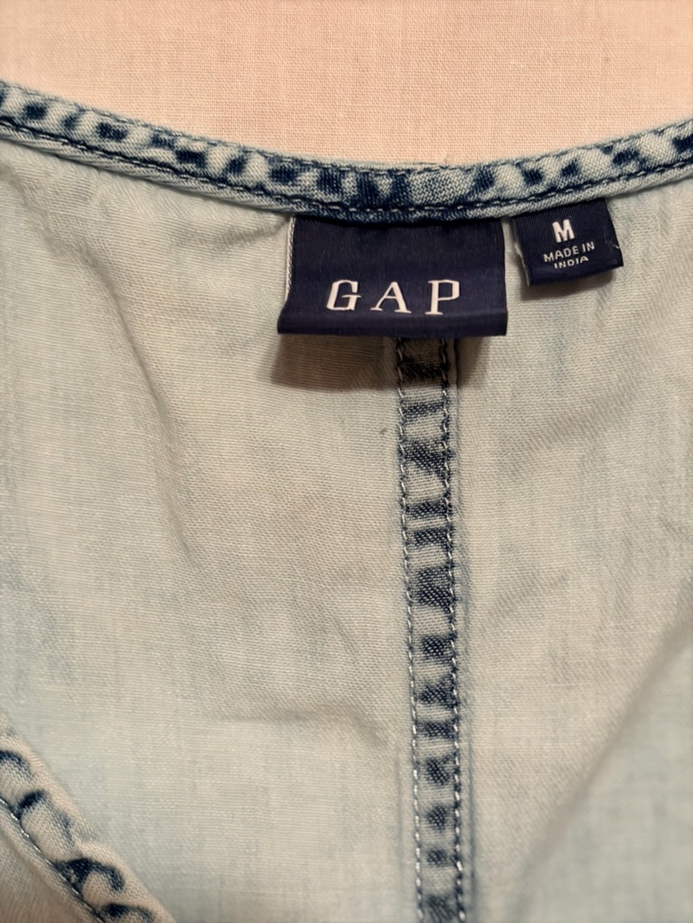 Gap denim dress features a v-neckline, sleeveless straps, button-up front. - Picture 4 of 9